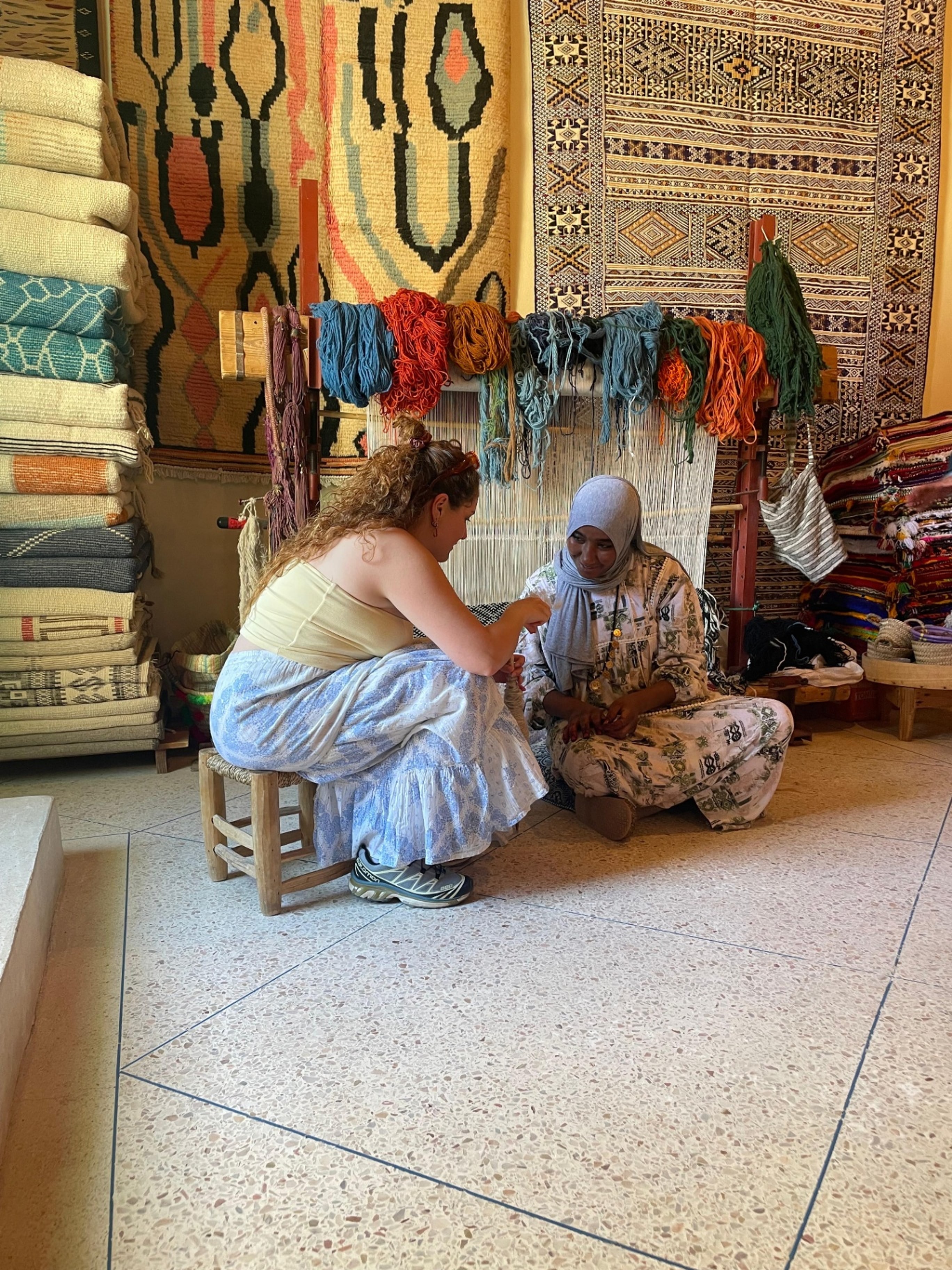 A weaver of the Taznakht women's cooperative at her loom